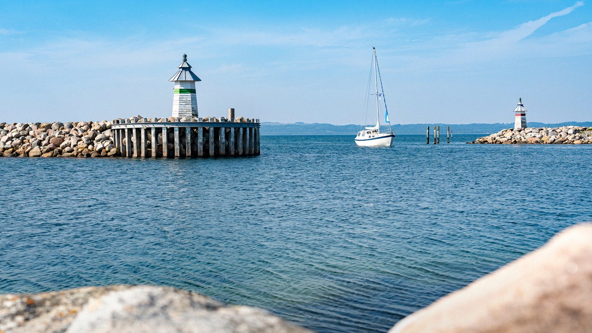 The harbour entrance of Ebeltoft with its two signal towers on the stone moles