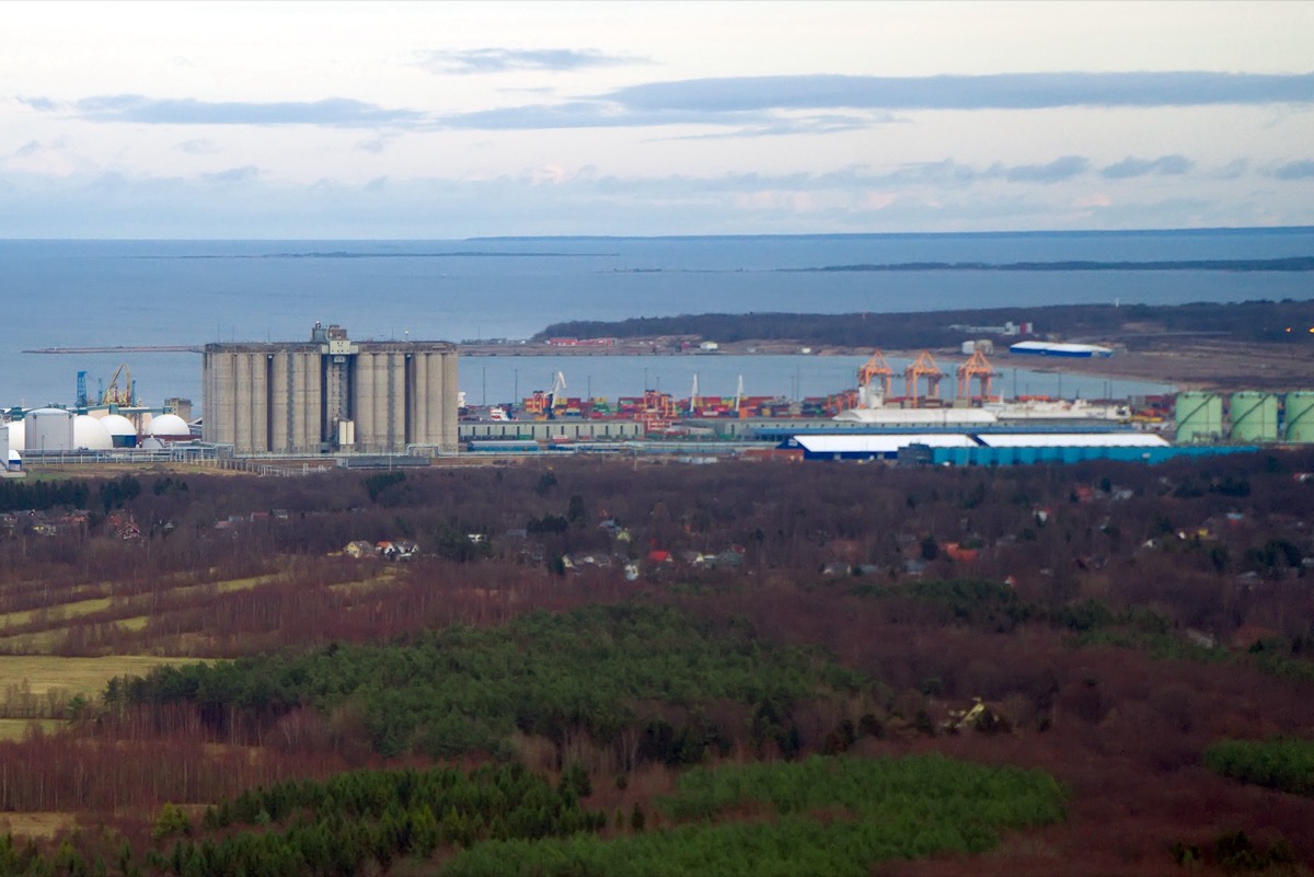 Aerial view of the industrial port of Muuga near Tallinn, with grain silos, container handling and a view of the Baltic Sea