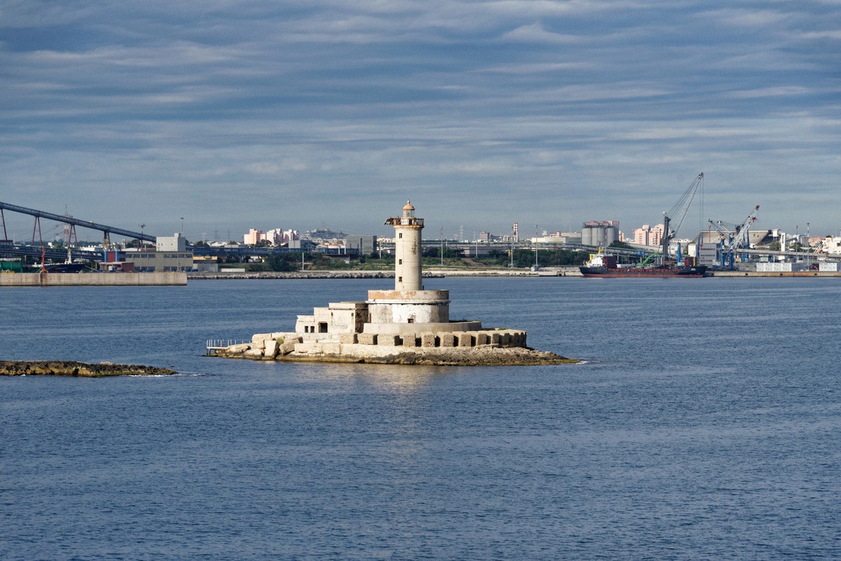 Historic lighthouse on a small island in the harbour of Brindisi