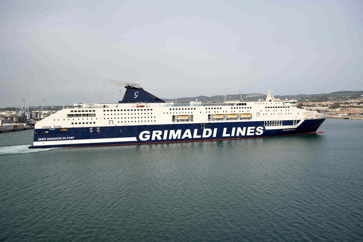 The Grimaldi Lines ferry Cruise Roma, marked with the words 'Zero Emission', sailing into Port