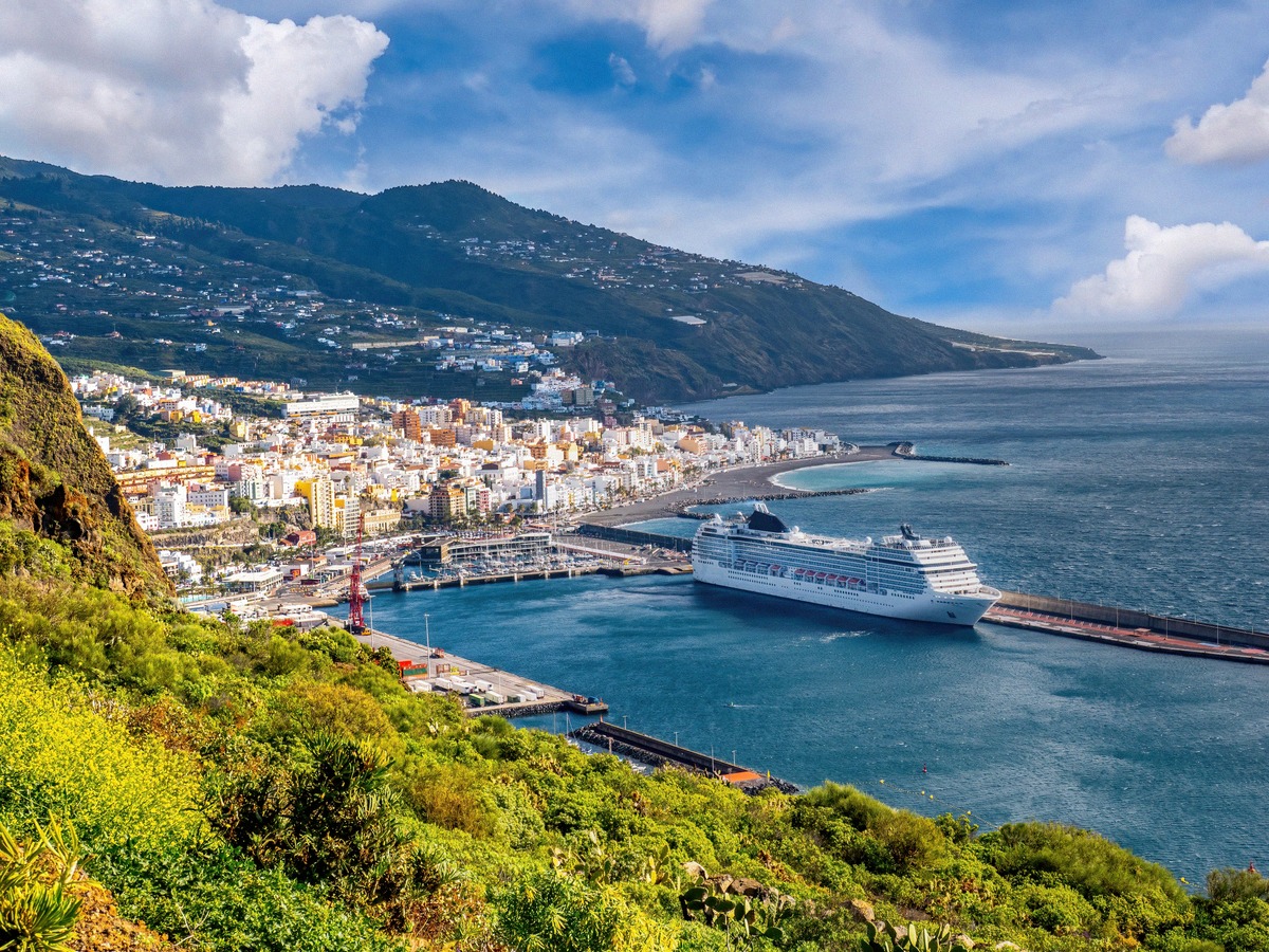 Panoramic view of Santa Cruz de la Palma harbour with a large cruise ship