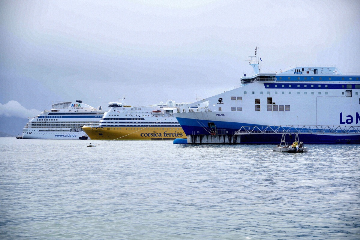 Panoramic view of the harbour of Toulon with ferries and a cruise ship