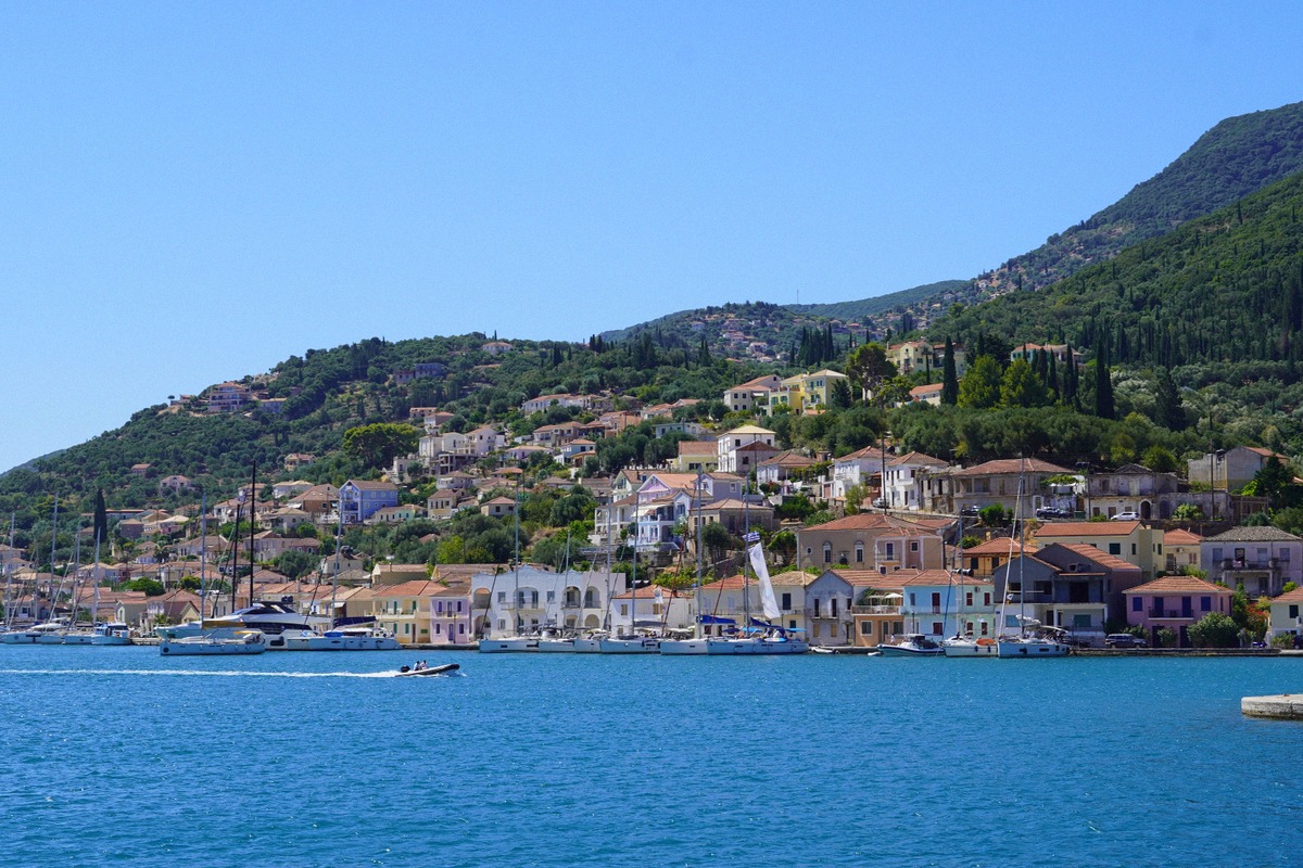 A picturesque harbour town in the Ionian Islands with colourful houses