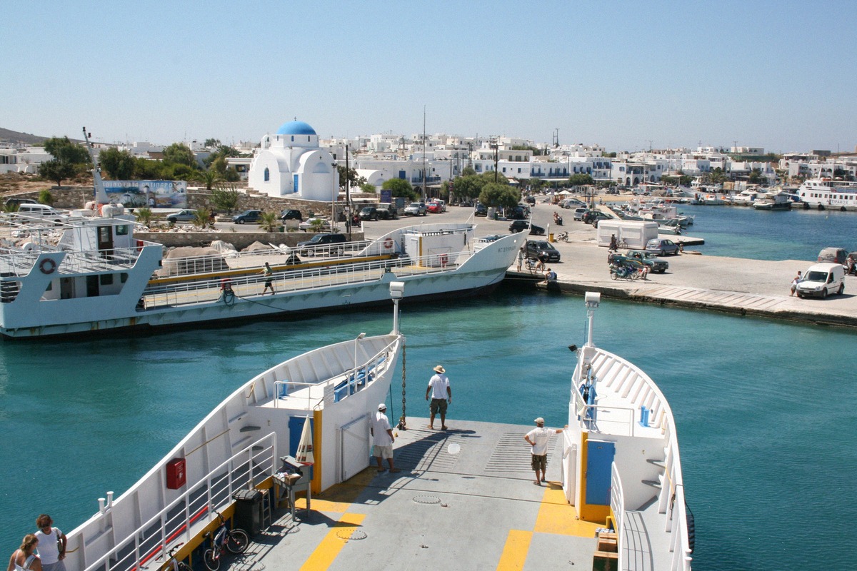 Small harbour on Paros with a ferry docking