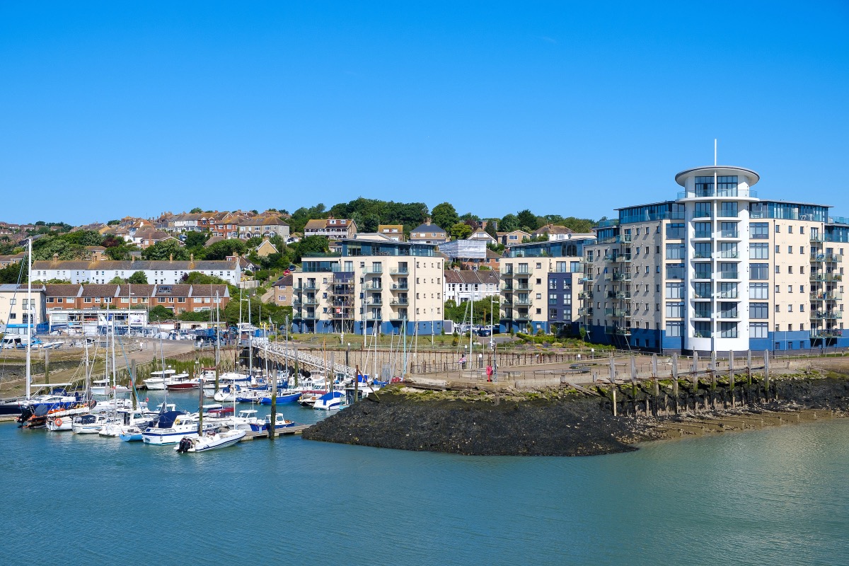 View of Newhaven Marina with moored sailboats