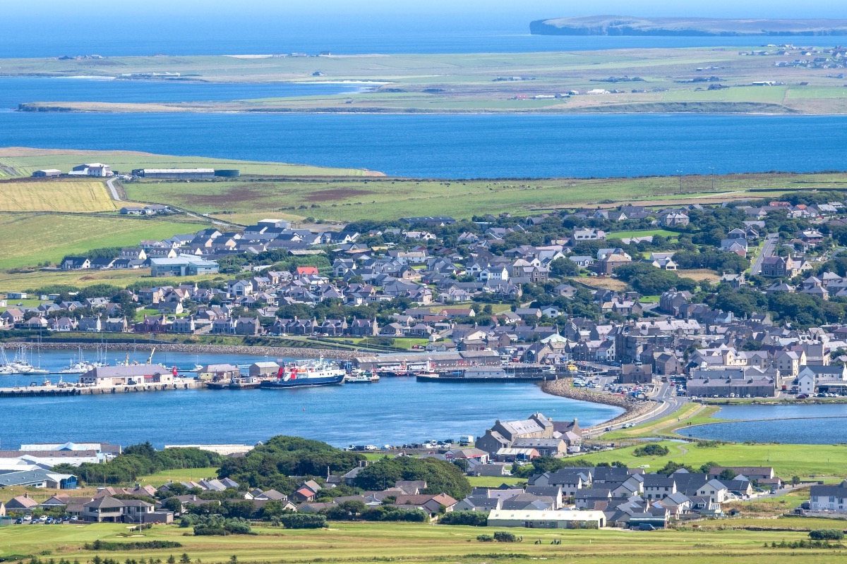Wide aerial view of Kirkwall, the capital of the Orkney Islands, with its harbor
