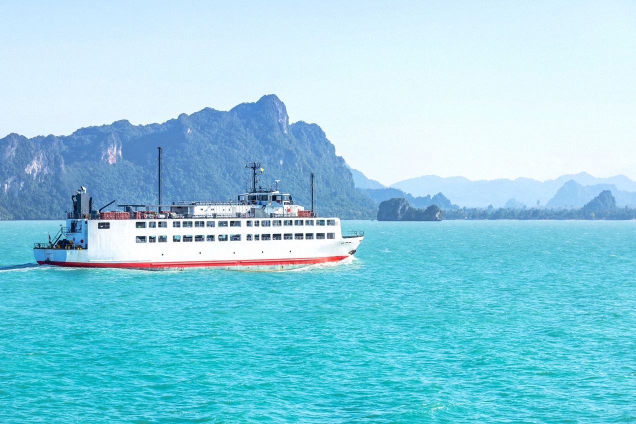 Ferry between Koh Samui and Surat Thani off the limestone cliffs of the coast
