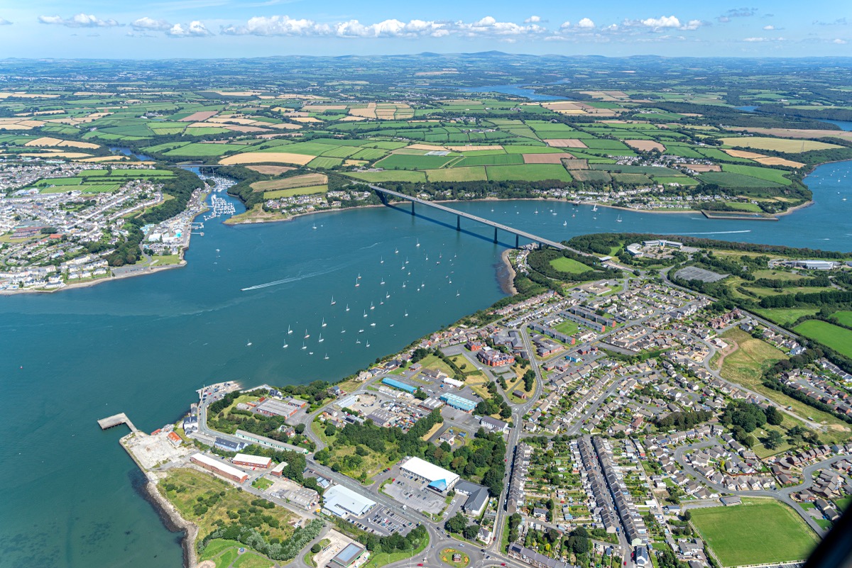 Aerial view of Pembroke Dock and the River Cleddau with its distinctive suspension bridge